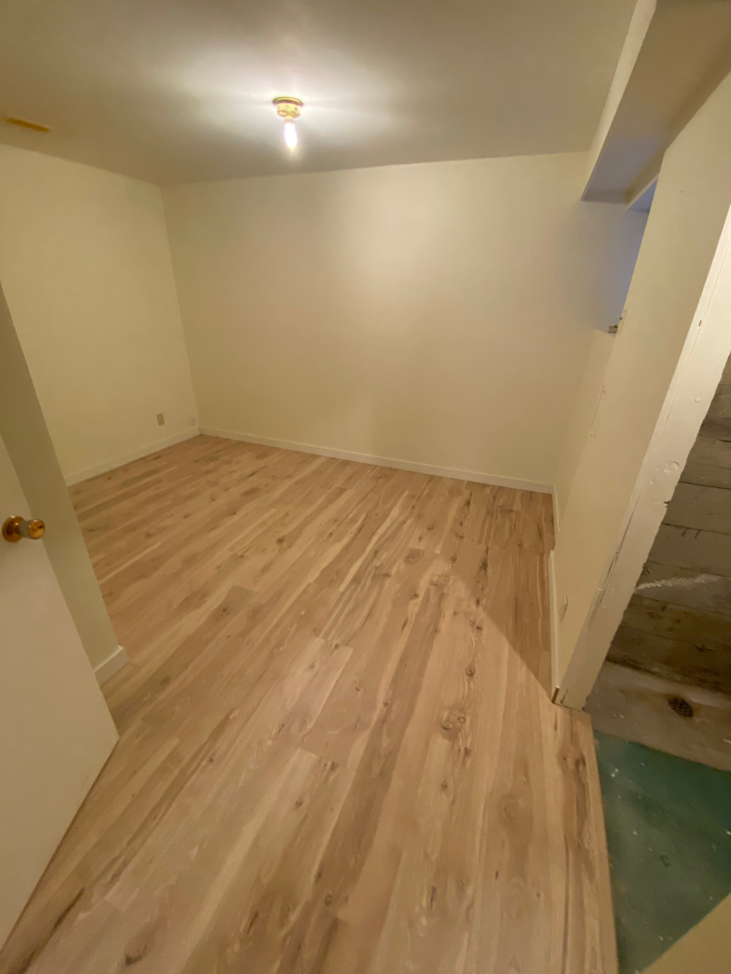 Laminate floor installed in a basement suite