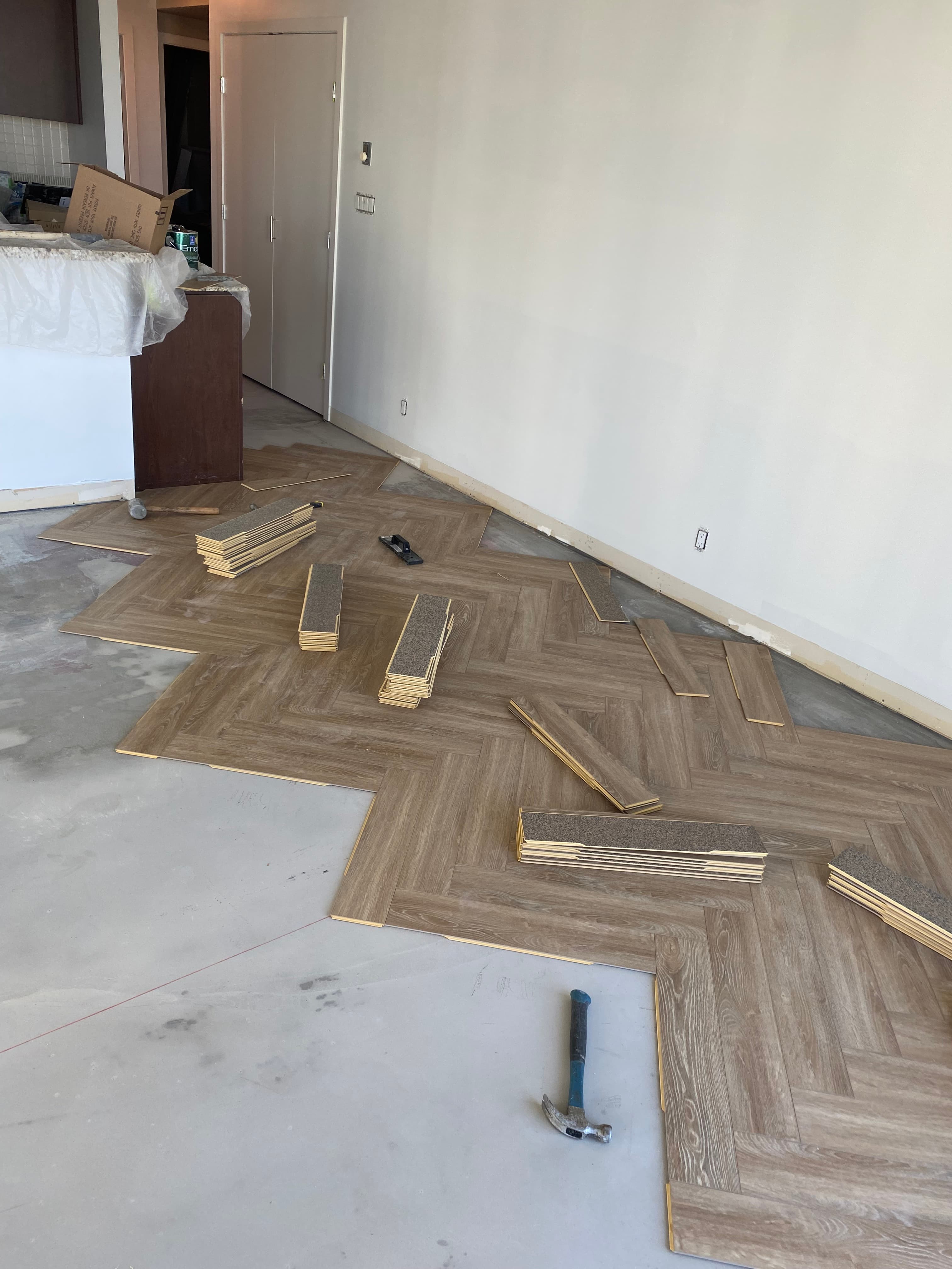 Click vinyl herringbone installation