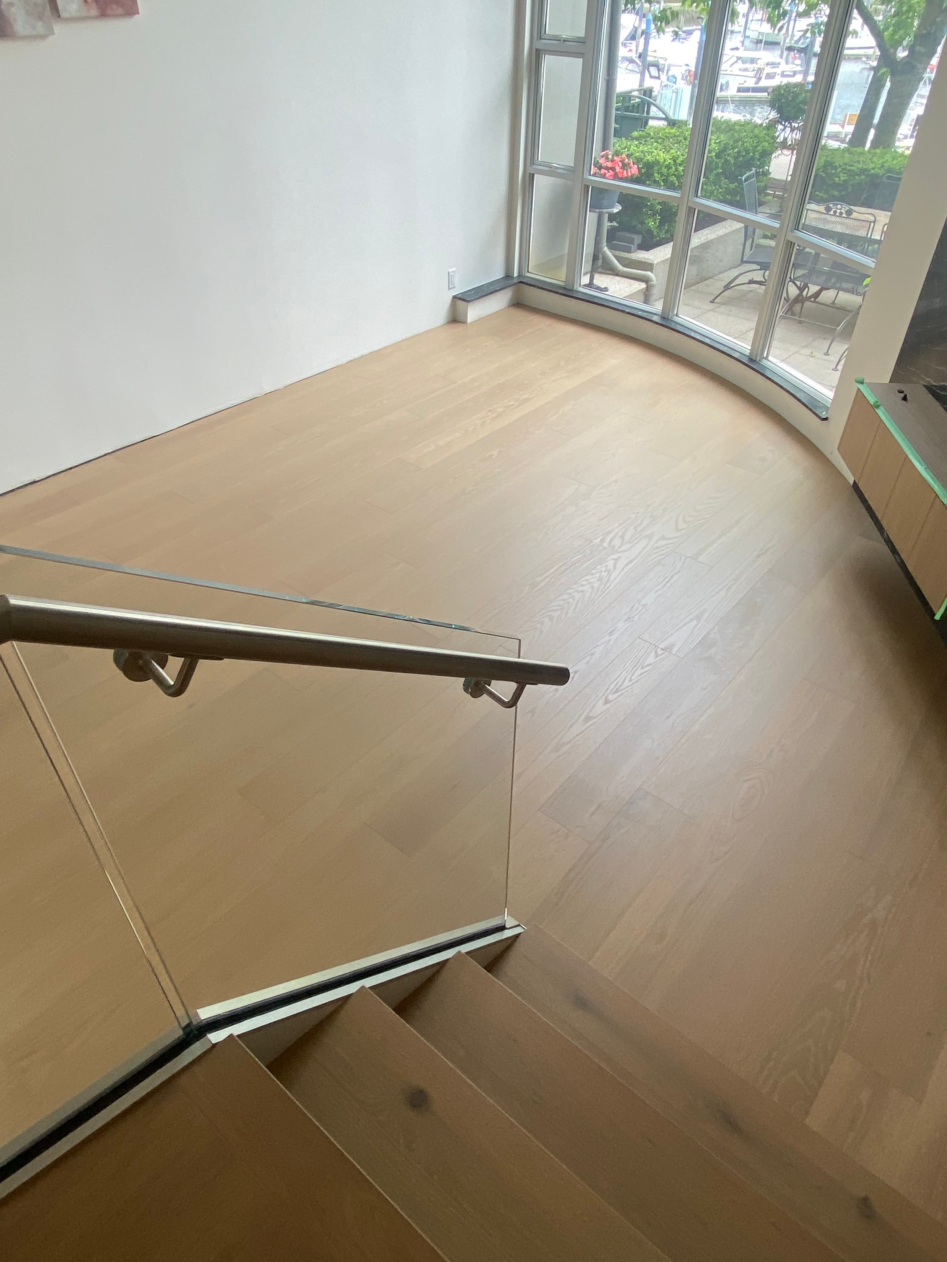Engineered hardwood in a sunken living room